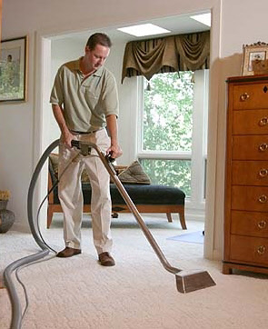 Milwaukee web design depicting AMS carpet cleaning technicians in action!