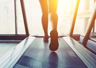 Woman Running on a Treadmill Waukesha