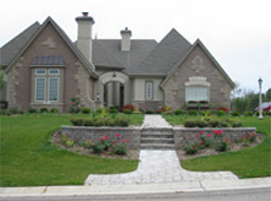 Milwaukee web development with a high resolution Before and After Gallery showcasing Badger Landscaping's professional, quality landscaping services on this Waukesha home!